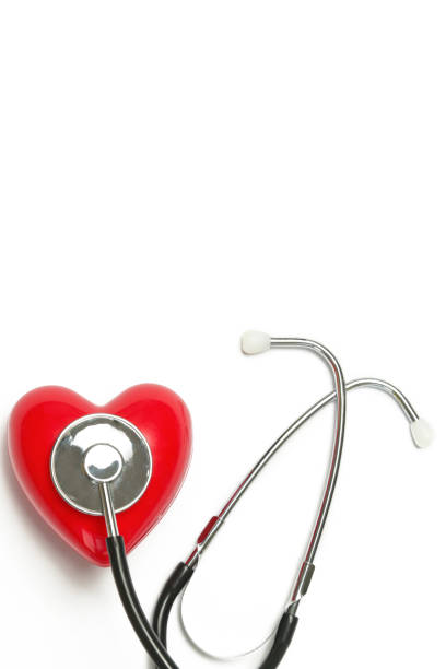istock Red heart and a stethoscope isolated on white background 1195014369