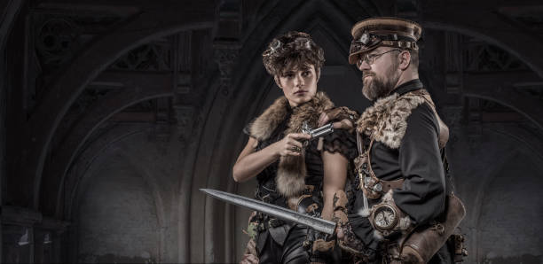 istock Steampunk couple in a studio shot 1195019098