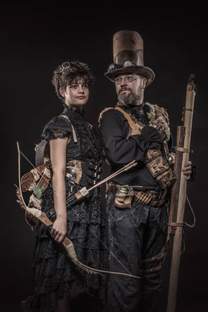 istock Steampunk couple in a studio shot 1195019940