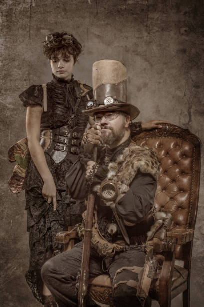 istock Steampunk couple in a studio shot 1195020061