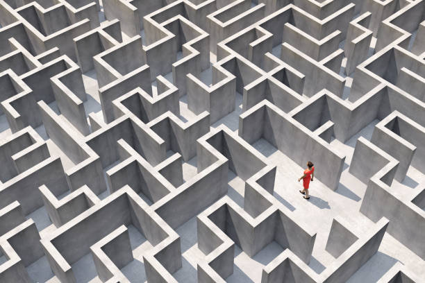 istock Businesswoman in a full frame complex maze 1195020064
