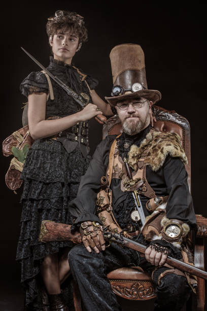 istock Steampunk couple in a studio shot 1195020114