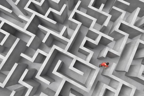 istock Businesswoman in a full frame complex maze 1195020169