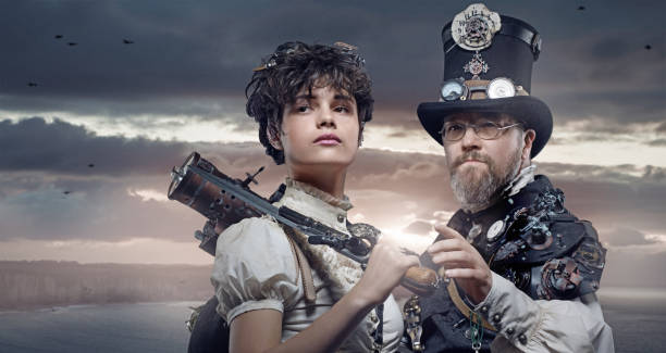Steampunk couple in a studio shot Steampunk couple of male and female enthusiasts in a studio shot steampunk pistol pictures stock pictures, royalty-free photos & images