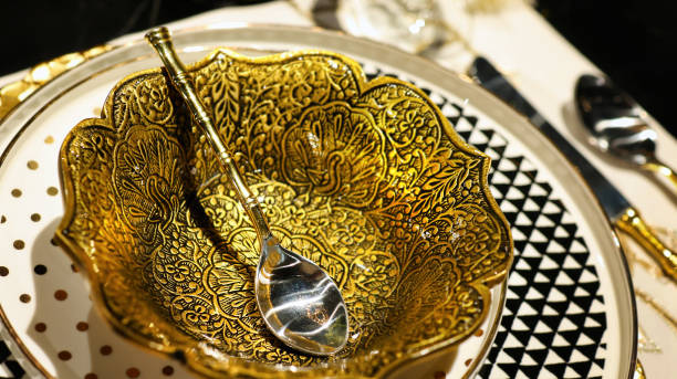 dinner set in golden color theme closeup
