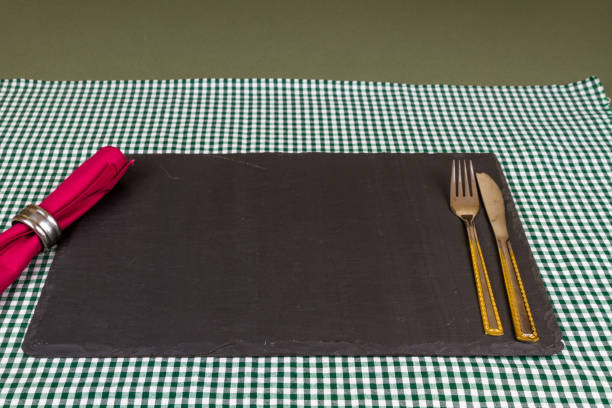 istock Dinner placing with slate mat, cutlery and napkin 1195022247
