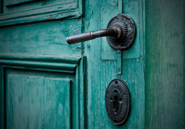 istock Metal door handle - architectural detail with copy space 1195023101
