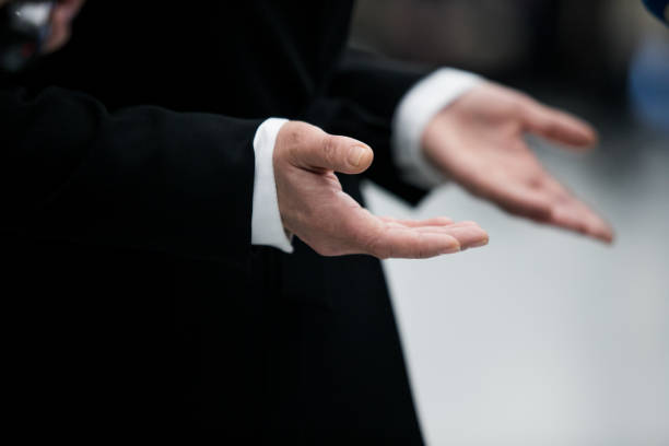 istock Journalist With Microphone Interviewing Businessman, politician 1195023158