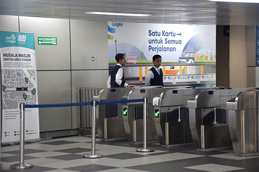Jakarta, Indonesia - July 25, 2019: Passenger MRT train goes to the exit at Bundaran HI MRT station. MRT is a fast and convenient transportation in Jakarta, Indonesia