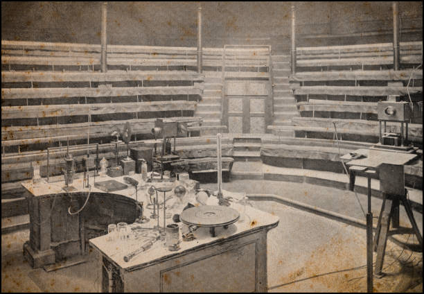 ilustrações, clipart, desenhos animados e ícones de fotografias de londres antigas: mesa de faraday no royal institution - 1897