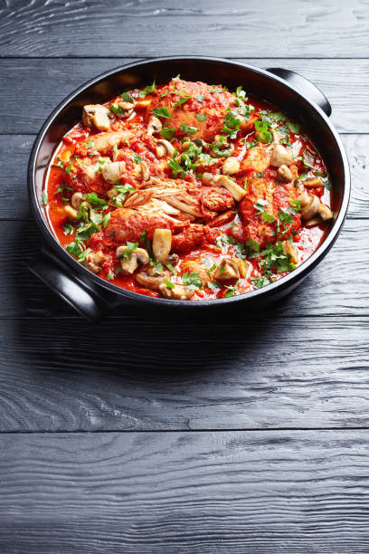 istock Chicken Cacciatore with tender chicken breasts, tomatoes, bell peppers, carrots and sliced mushrooms 1195033100