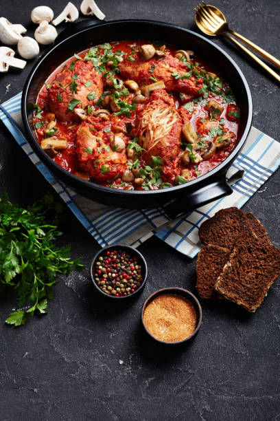 istock Chicken Cacciatore with tender chicken breasts, tomatoes, bell peppers, carrots and sliced mushrooms 1195033140