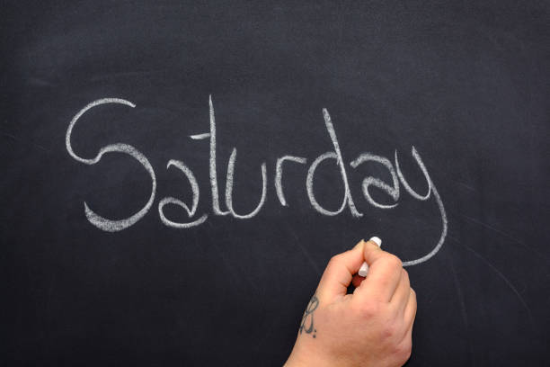 istock Saturday on the blackboard 1195036129