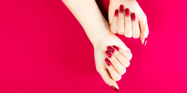 istock Stylish trendy red female manicure 1195045740
