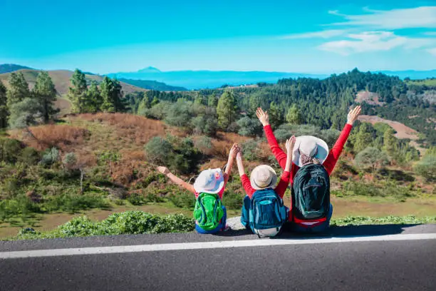 Photo of happy family-mother with son and daughter-enjoy travel in nature