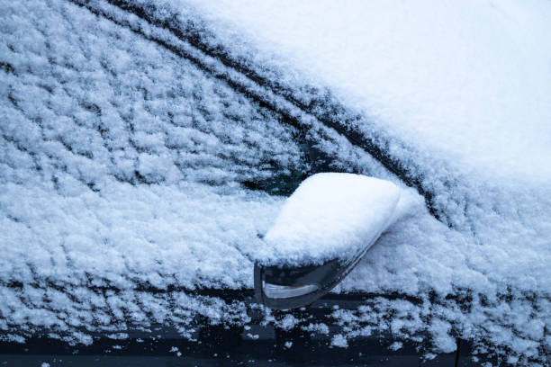 istock The car is covered in snow. 1195049087