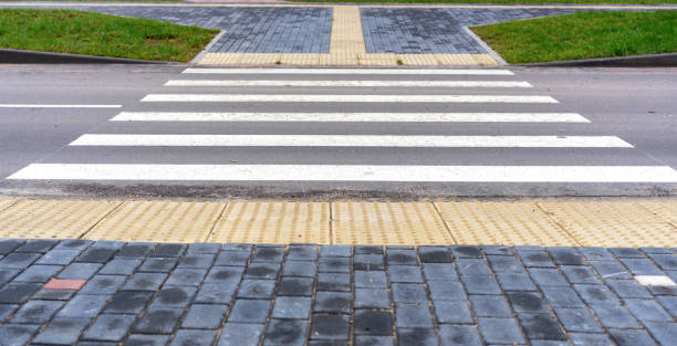 istock An adapted environment for visually impaired people in a modern city. A special pavement coating is tactile tiles for the disabled. 1195051606