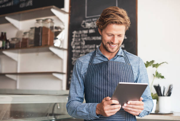 istock Testing new online systems to incorporate in his startup 1195053436