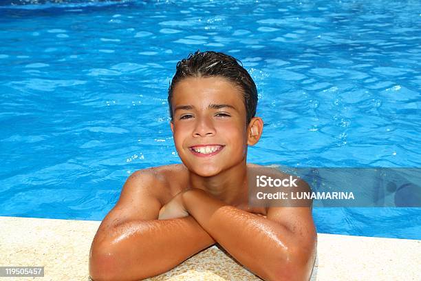 Boy Happy Teenager Vacation Swimming Pool Stock Photo - Download Image Now - Active Lifestyle, Adolescence, Arms Crossed