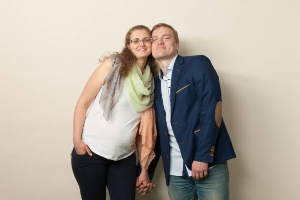 istock Studio portrait of a heterosexual couple 1195055176