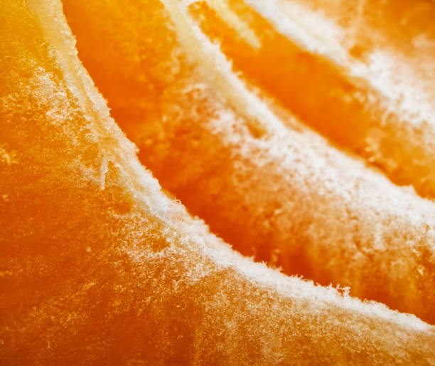 Clementine mandarin slices on the background of macro.