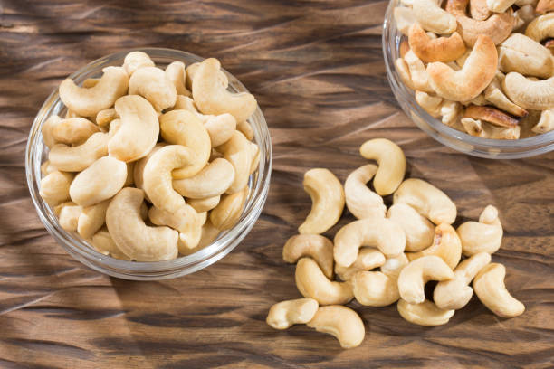 istock Unshelled roasted and salted cashew nuts - Anacardium occidentale 1195057230