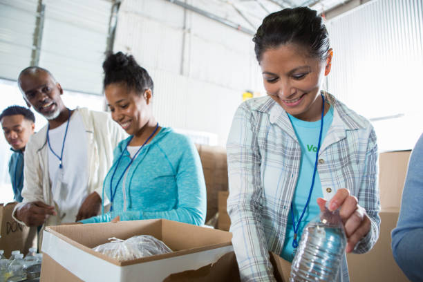 istock Volunteers working in food pantry 1195063545
