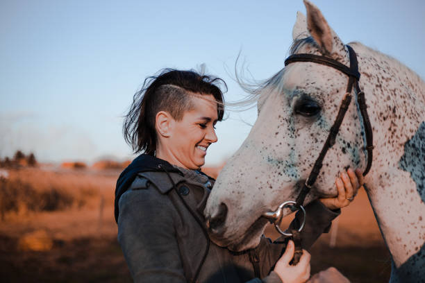 istock Women with horse 1195065998