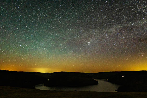 istock Dark starry sky over remote Welsh countryside 1195066001