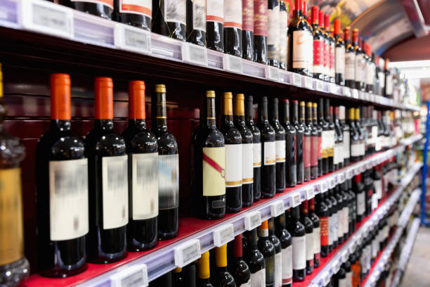 istock Wine bottles in supermarket 1195071617