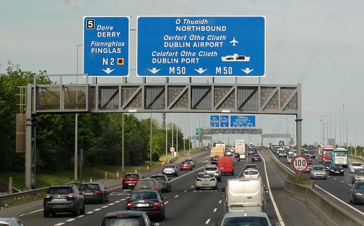 Scene Of Road Sign, Direction Sign,  Irish Highway Traffic Jam During Rush Hour In Republic Of Ireland Europe