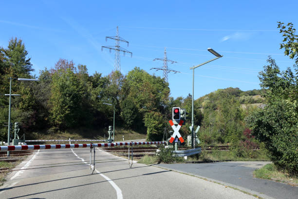 istock Barrier at the railway crossing 1195077756