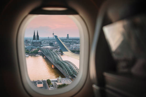 istock Cologne, Germany, at sunset as seen from an airplane window 1195081015