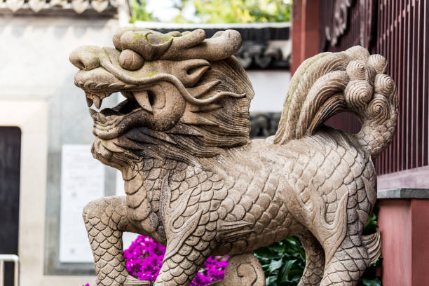 istock Stone Kylin (Qilin) statue in chenghuang temple shanghai, China. A mythical hooved chimerical creature known in Chinese and other East Asian cultures 1195082500