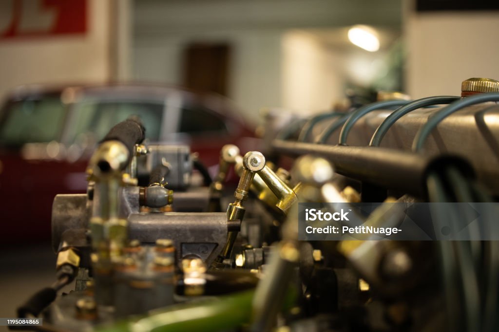 Motor cylinder head engine repair old vintage renovated Auto Repair Shop Stock Photo