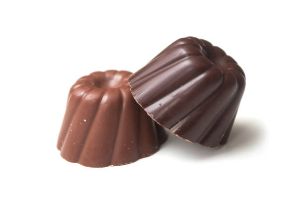 istock two Chocolates in shaped kouglofs on white background 1195085308