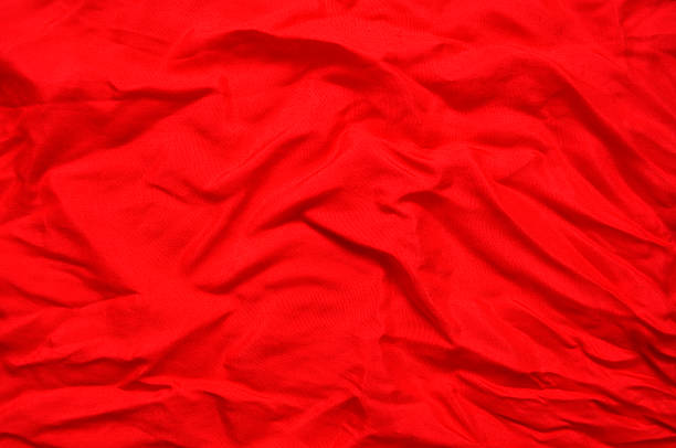 istock Background of red crumpled silk 119508576