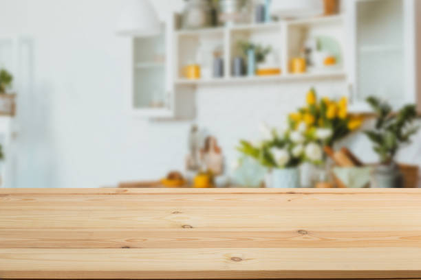 istock Wooden board empty table in front of a blurred background. Perspective brown wood with a blurred background of the kitchen and kitchen equipment - can be used to demonstrate or assemble your products. 1195086238