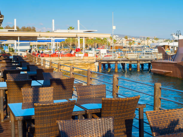 Sea restaurant in Paphos marina at sunset. Cyprus