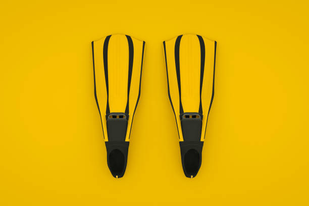 istock Yellow Flippers isolated on yellow background. 3D rendering 1195092030