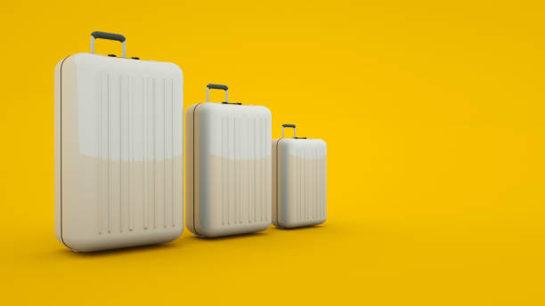 istock Three suitcases isolated on yellow background, 3d illustration 1195092807