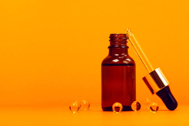 istock Face serum and vitamin capsules 1195096376