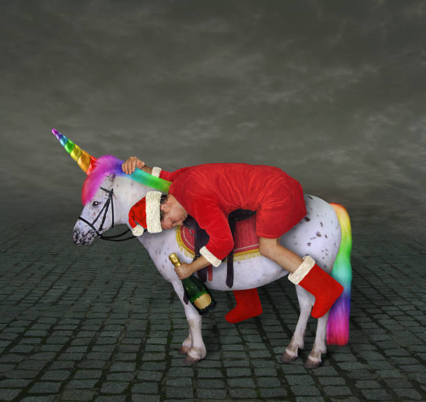 istock Drunk Santa rides unicorn 1195096712