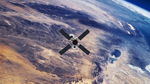 Spy Satellite orbiting Earth. NASA Public Domain Imagery GPS or Weather Satellite orbiting Earth public domain images stock pictures, royalty-free photos & images