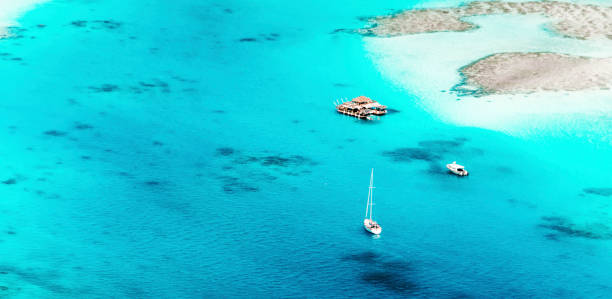 Boat Sailing on the Amazing Turquoise Water in the Indian Ocean, Zanzibar, Tanzania