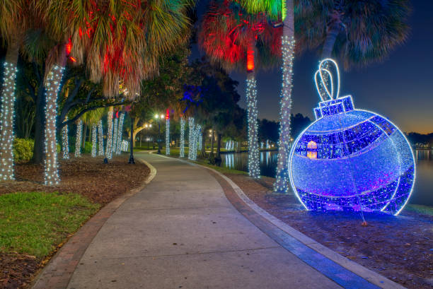 Early Morning Lake Eola Park During the Christmas Holiday Season in Downtown Orlando Florida USA Early morning Lake Eola Park during the Christmas holiday season in Downtown Orlando, Florida, USA. florida christmas stock pictures, royalty-free photos & images