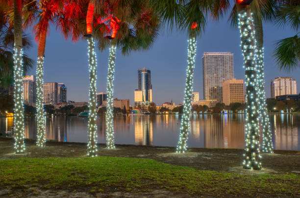 Early Morning Lake Eola Park During the Christmas Holiday Season in Downtown Orlando Florida USA Early morning Lake Eola Park during the Christmas holiday season in Downtown Orlando, Florida, USA. florida christmas stock pictures, royalty-free photos & images