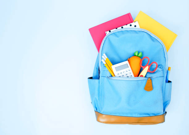 istock Blue school backpack with accessories,bag with supplies empty space. 1195110907