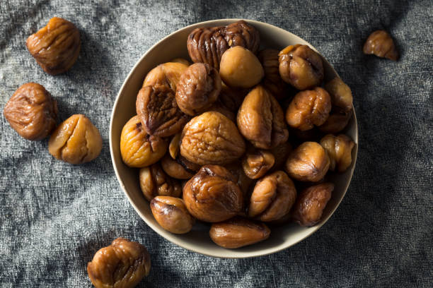 istock Organic Shelled Roasted Chestnuts 1195111175