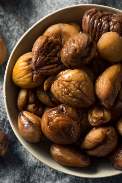 istock Organic Shelled Roasted Chestnuts 1195112355